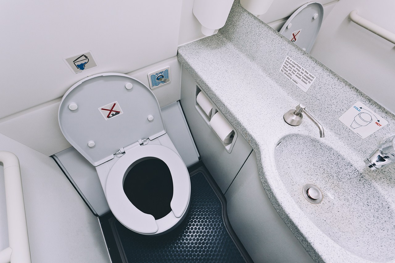 everything-you-need-to-know-about-plane-toilets-1530031460522.jpg