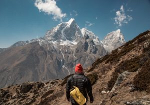 Man in red hat everest mountain