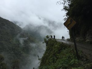 figures overlooking death road bolivia